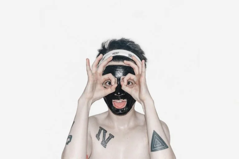a person with a mask on the face