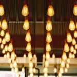 a group of lanterns from a ceiling