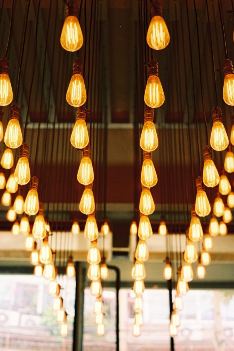 a group of lanterns from a ceiling