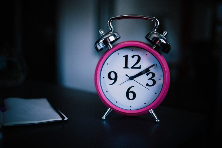 a pink alarm clock