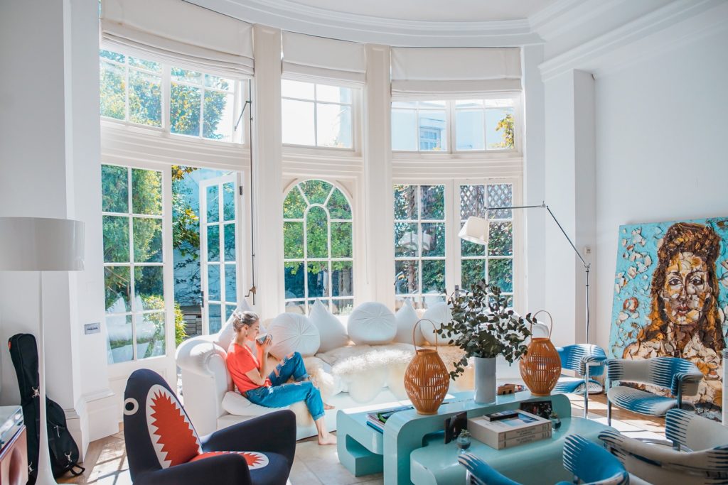 a group of people sitting in a living room