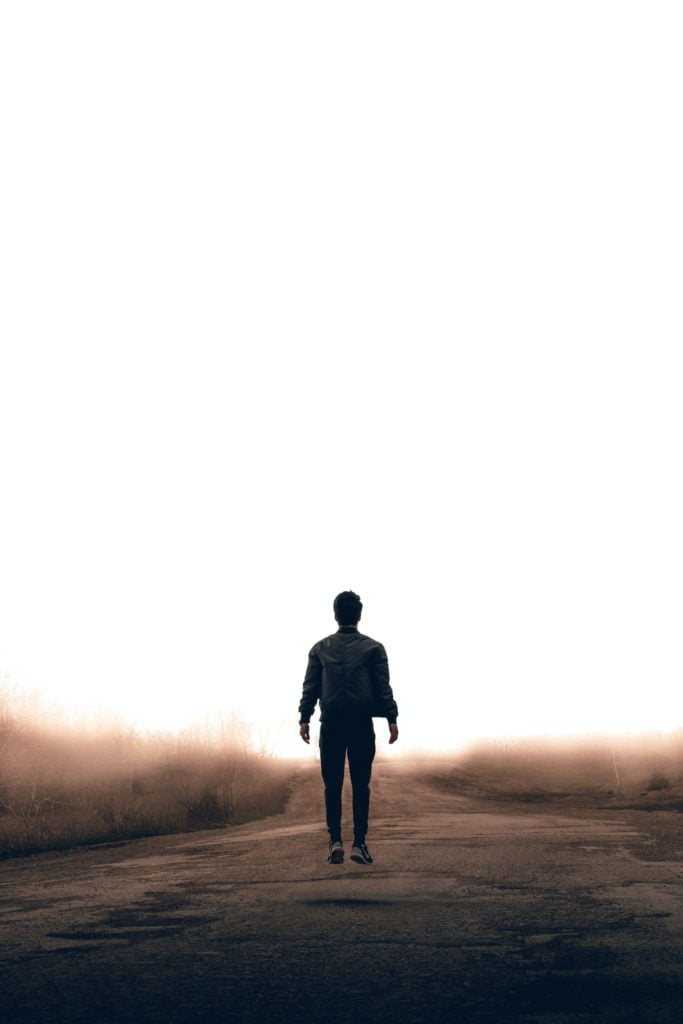 a person walking on a road