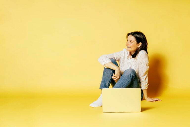 a person sitting on a box
